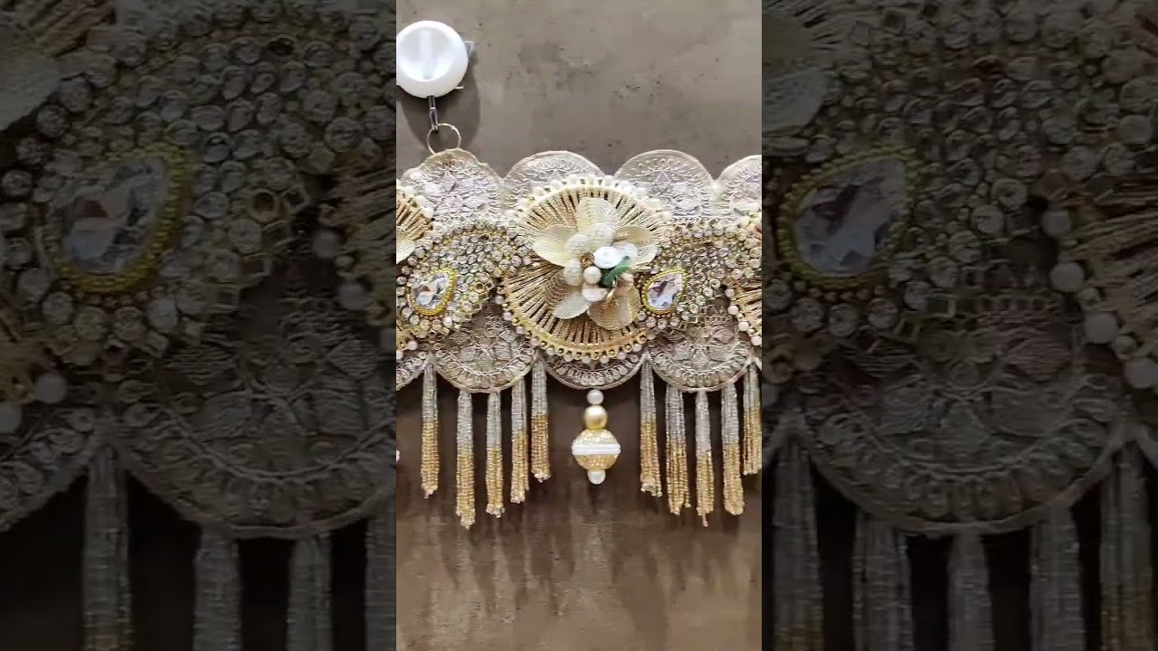 Heavy StoneWork Bandarwal adorned in the graceful Colour palette of cream golden and white #trending
