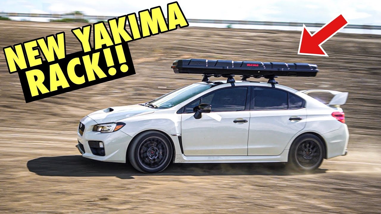 SUBARU STI YAKIMA ROOF RACK INSTALL (Best Fishing Setup ever!) rod/reel carrier & kayak mount