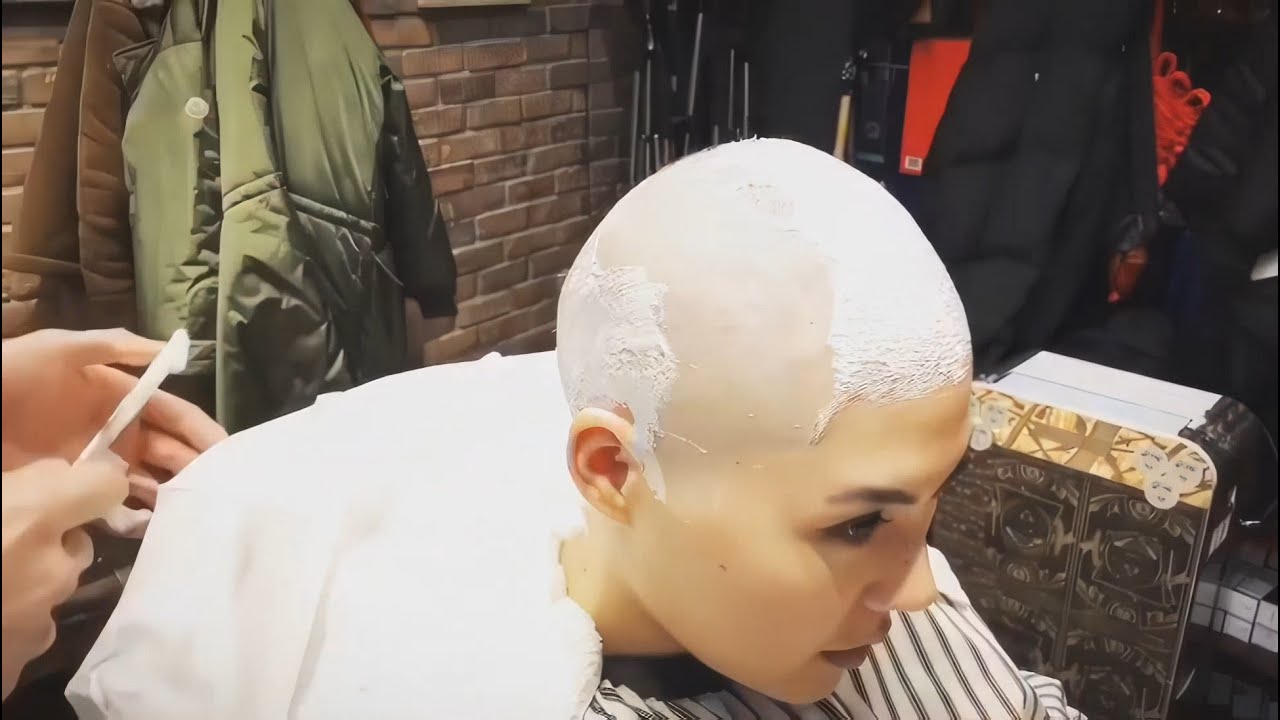 Chinese girl shaves her head bald at the barbershop (HD remaster)