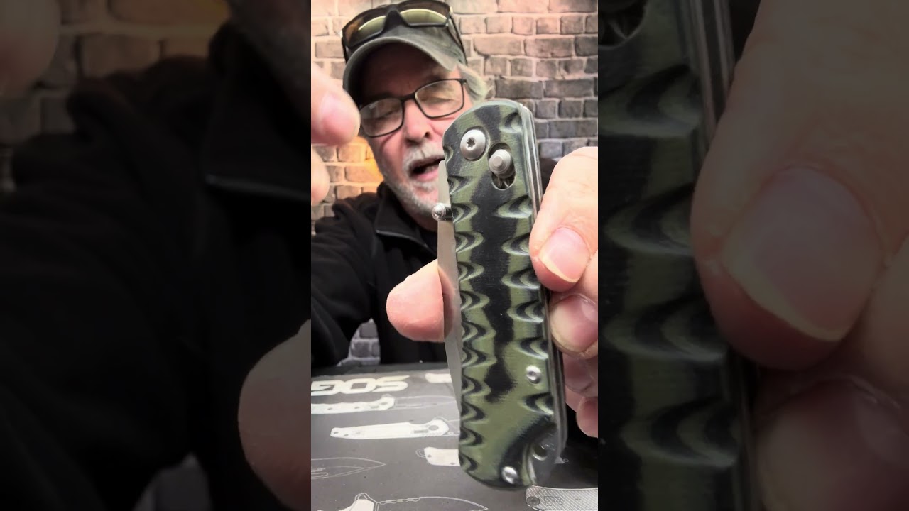 Знаменитый складной нож Ozark Trail Axis Lock за 5 долларов с накладками из микарты на заказ.