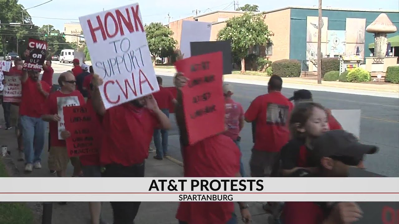 Union workers protest AT&T during contract negotiations