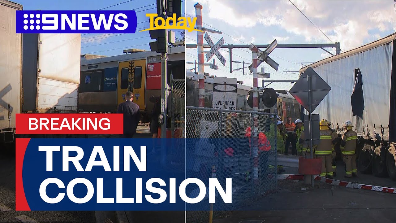 Truck and train collision at level crossing causes major traffic delays | 9 News Australia