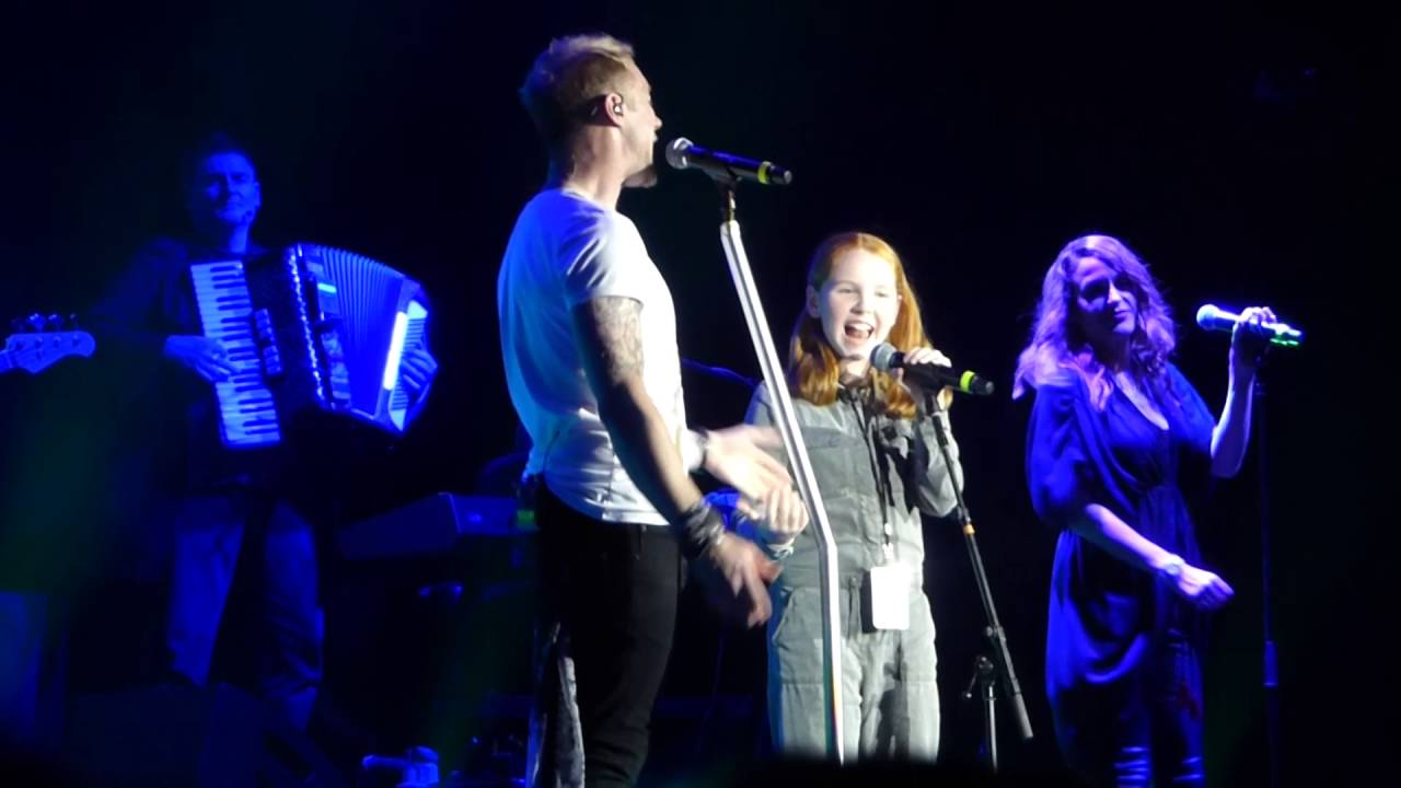 Ronan and Ali Keating singing 