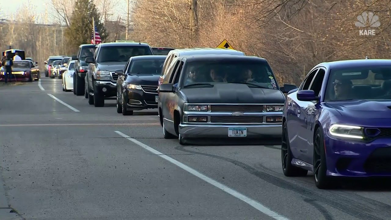 Birthday parade draws massive crowd