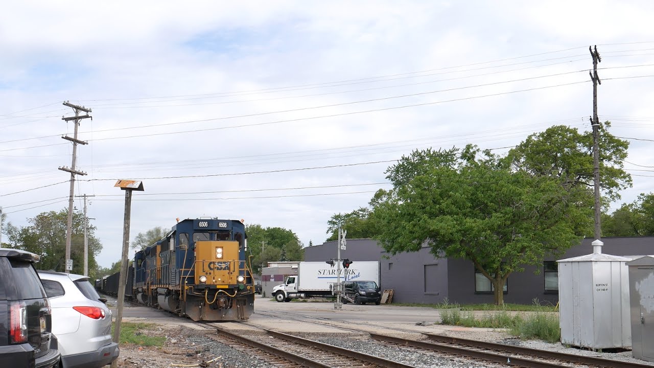 CSX Y106 6506 Leaving Grand Rapids Mi and Marquette Railroad 3343 Coming In