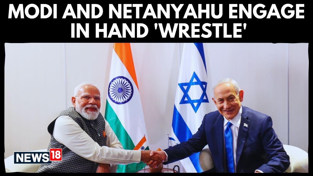 PM Narendra Modi and ‘Bibi’ Benjamin Netanyahu Engage in Playful Hand ‘Wrestle’ | India Israel-N18G