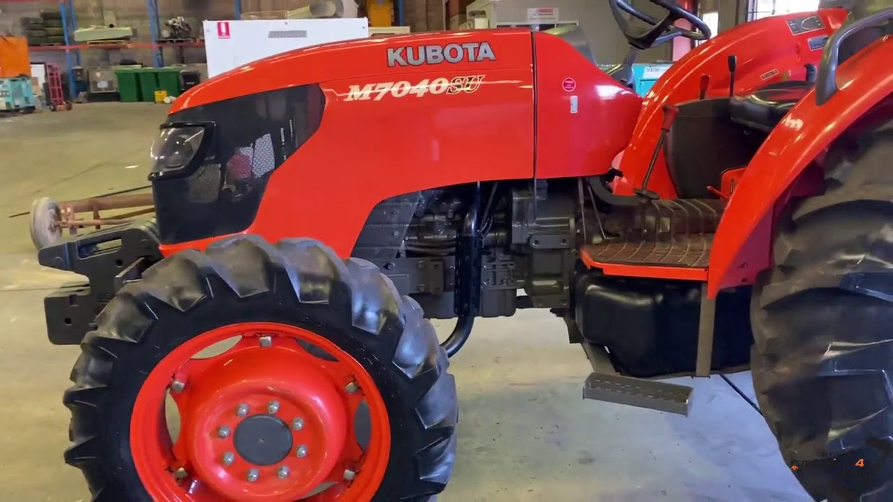 KUBOTA M7040SU 70 HP TRACTOR , AS NEW CONDITION , 386 HOURS T/T , 2014 MODEL ,4 WD .