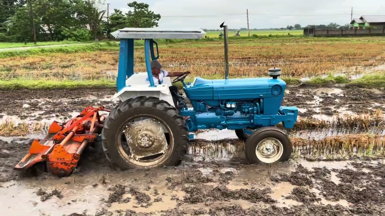 Ford 7000 tractor with 9 plates howard rotavator