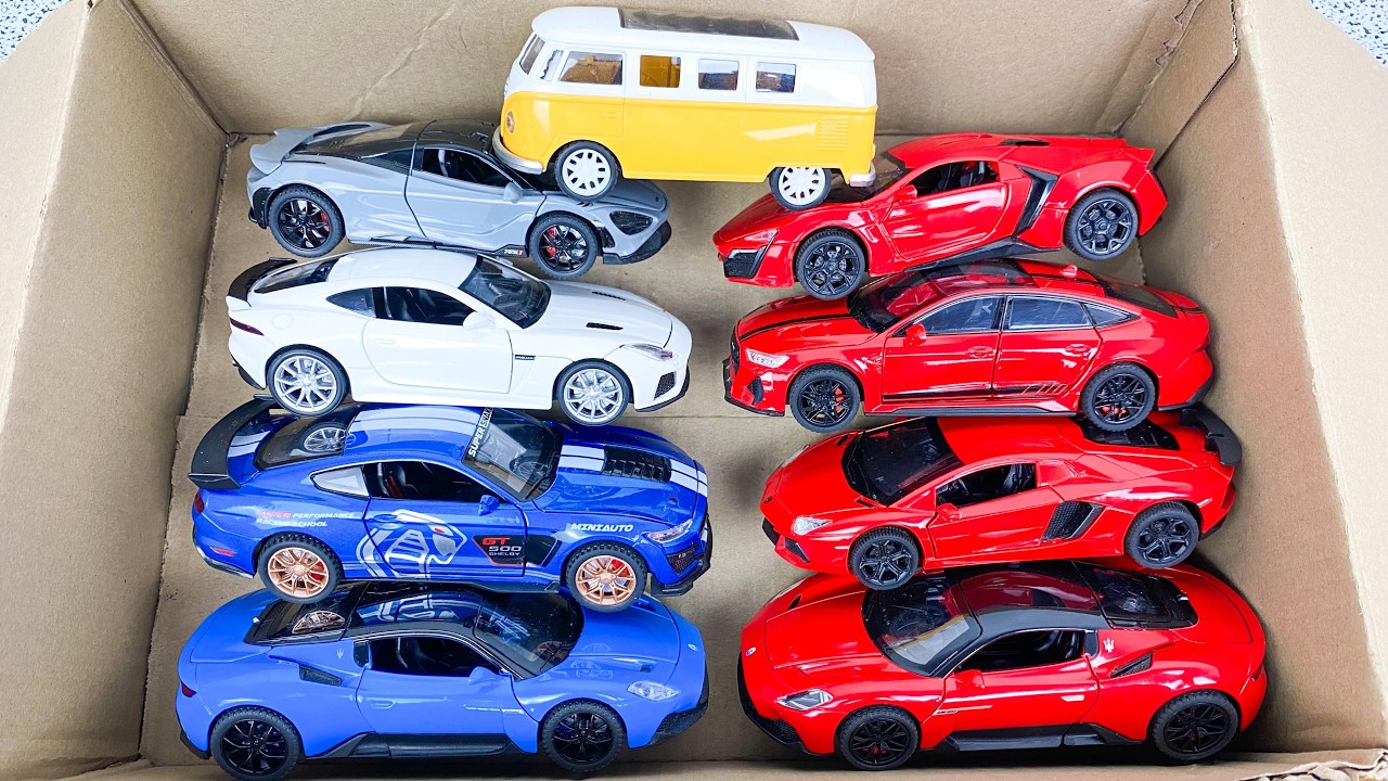 Box Full of Model Cars -Tesla Robotaxi, Tesla Cybertruck, Tesla Roadster, Lexus LC500, Lexus Lm 300h