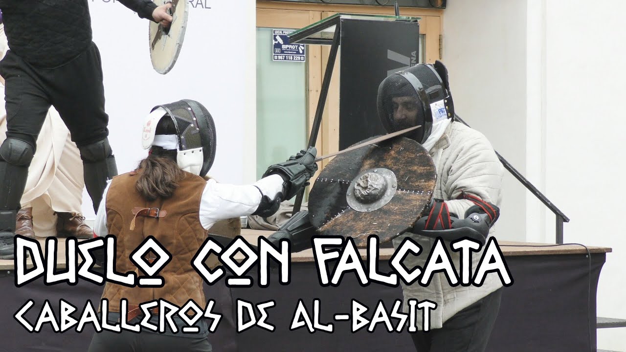 Recreación: Lucha de Falcata y lanza con caetra y scutum.