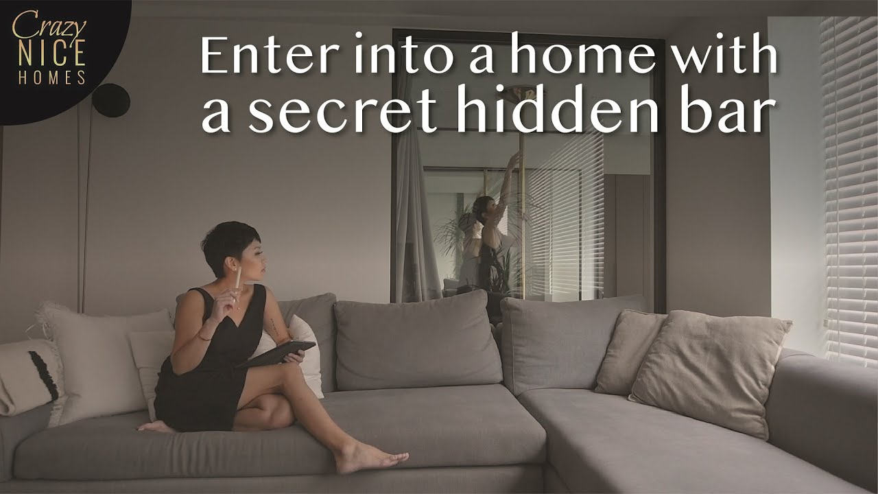 Step into this Singapore Artist's Condo with a Secret Hidden Bar