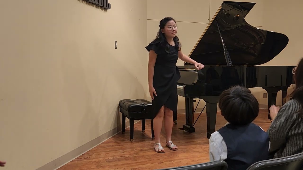 Concerto in D Minor for Piano and Band by John Thompson I.Allegro con brio
