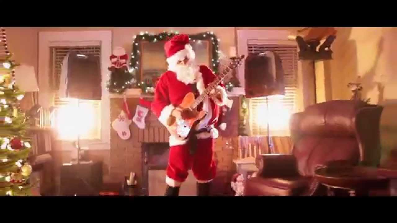 Santa Rocks Out to Feliz Navidad