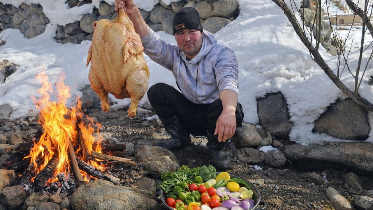 Chicken with potatoes cooked in the heart of nature  simple, hot, tasty, and prepared over an open 