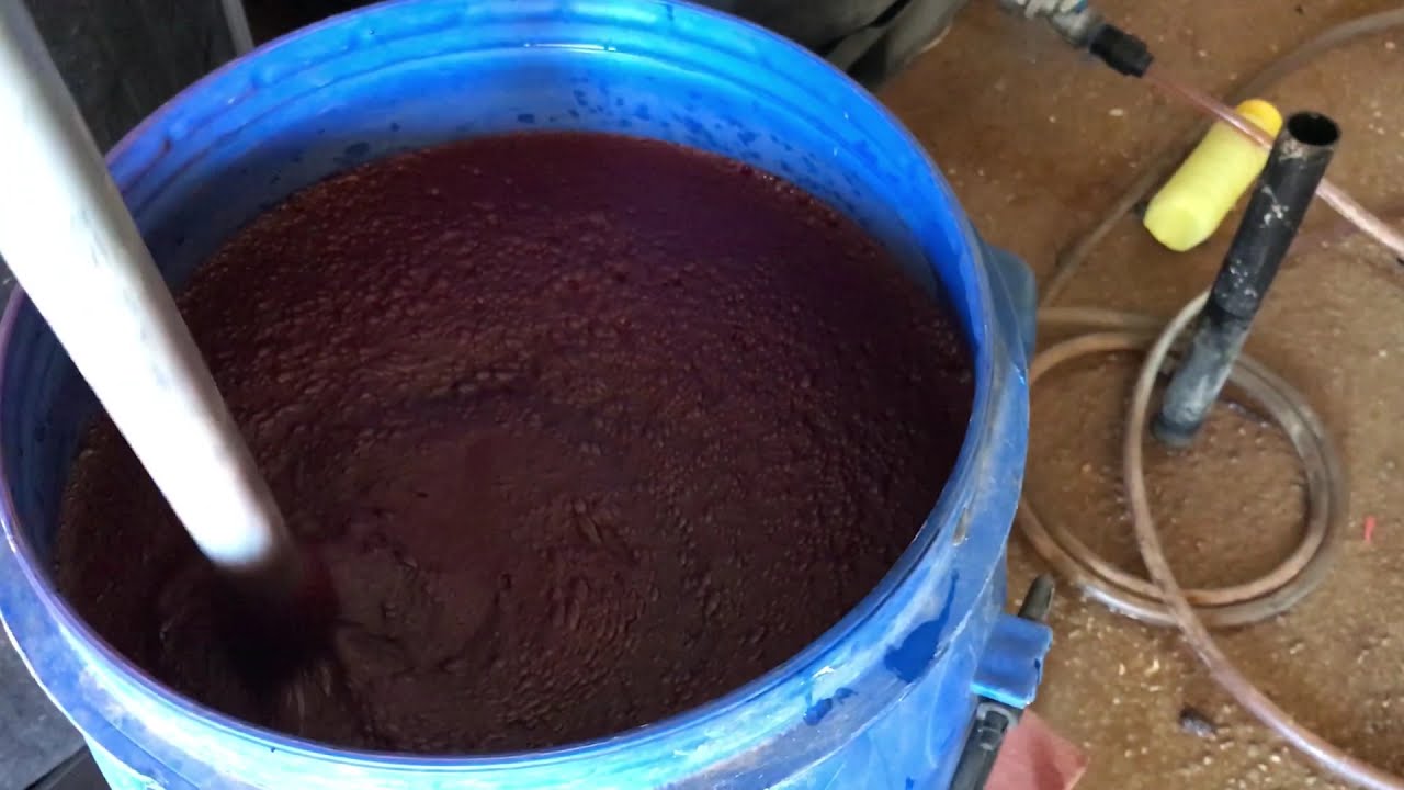 Adding chelated iron fertilizer to the irrigation system