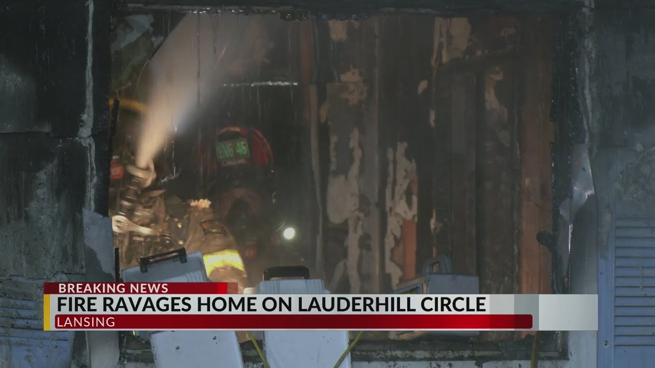 Crews tackle Lansing house fire Wednesday morning, save 2 dogs