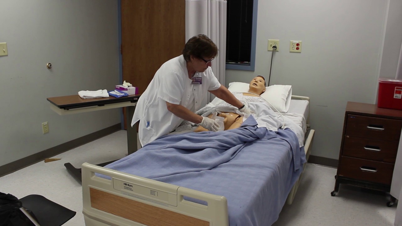 Assisting a male resident with a urinal