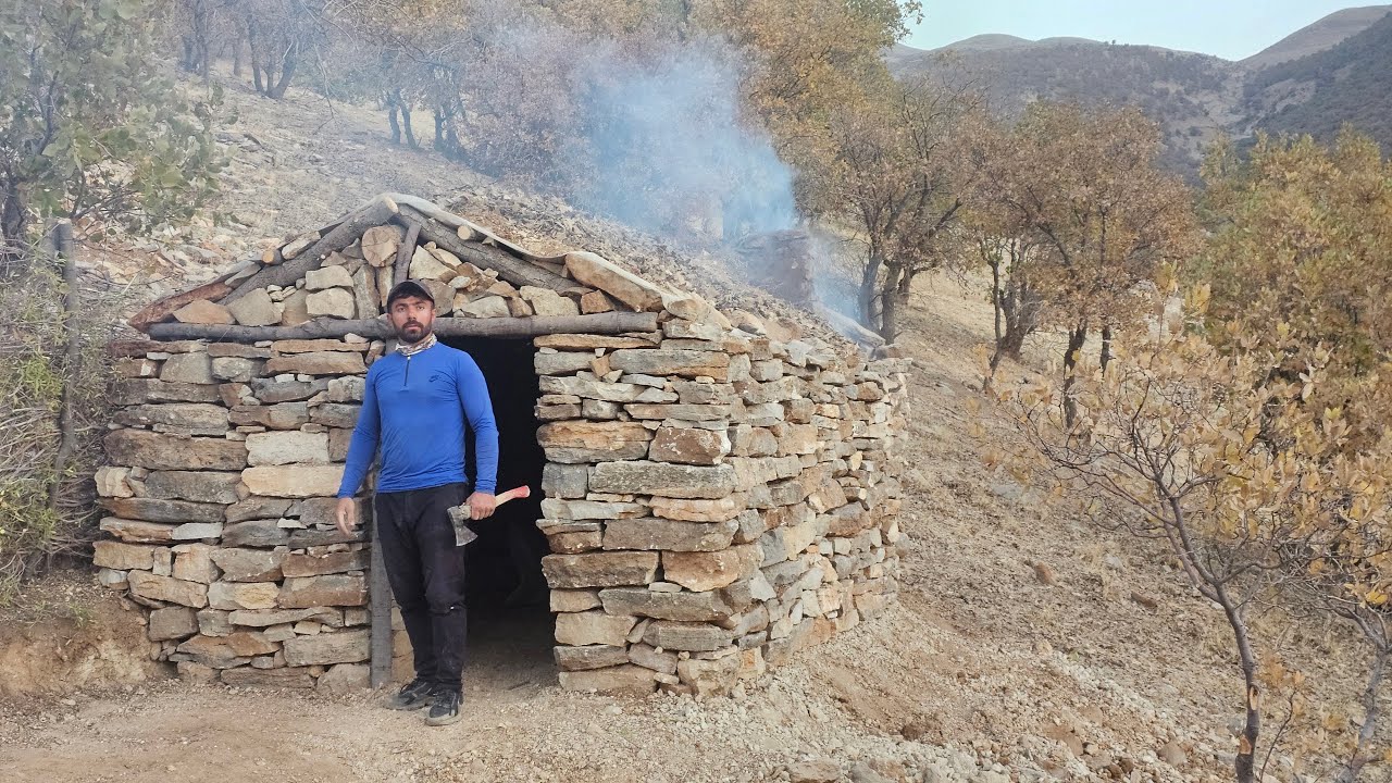 Designing a DIY winter Survival Shelter with fireplace.  bushcraft and stone shelter