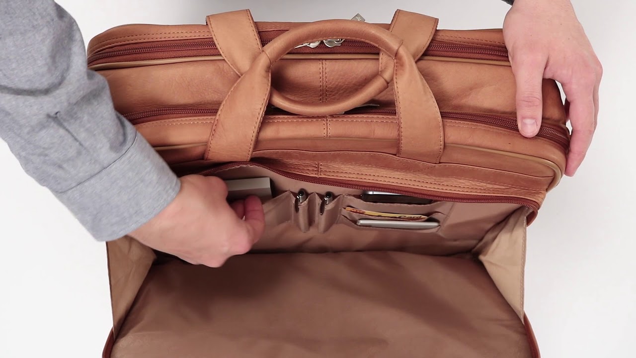 All About The SOLO Premium Leather Laptop Rolling Case