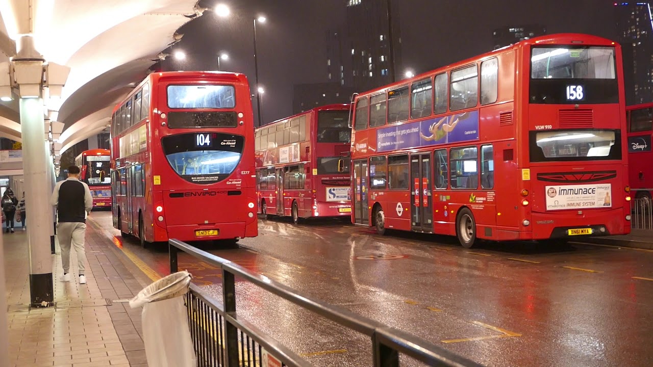 London Buses at Stratford in the rain at night 8th November 2020