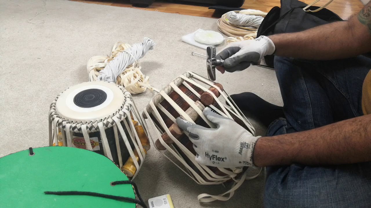Crazy Tabla Repairs-Tuning of a tabla dayan after pulling and re-heading.