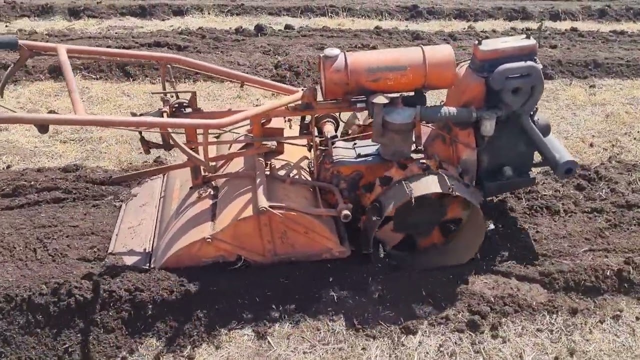 Vintage howard rotary hoe working