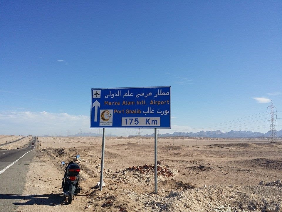 Safaga tour trip in sahara road of Egypt on scooter Sym