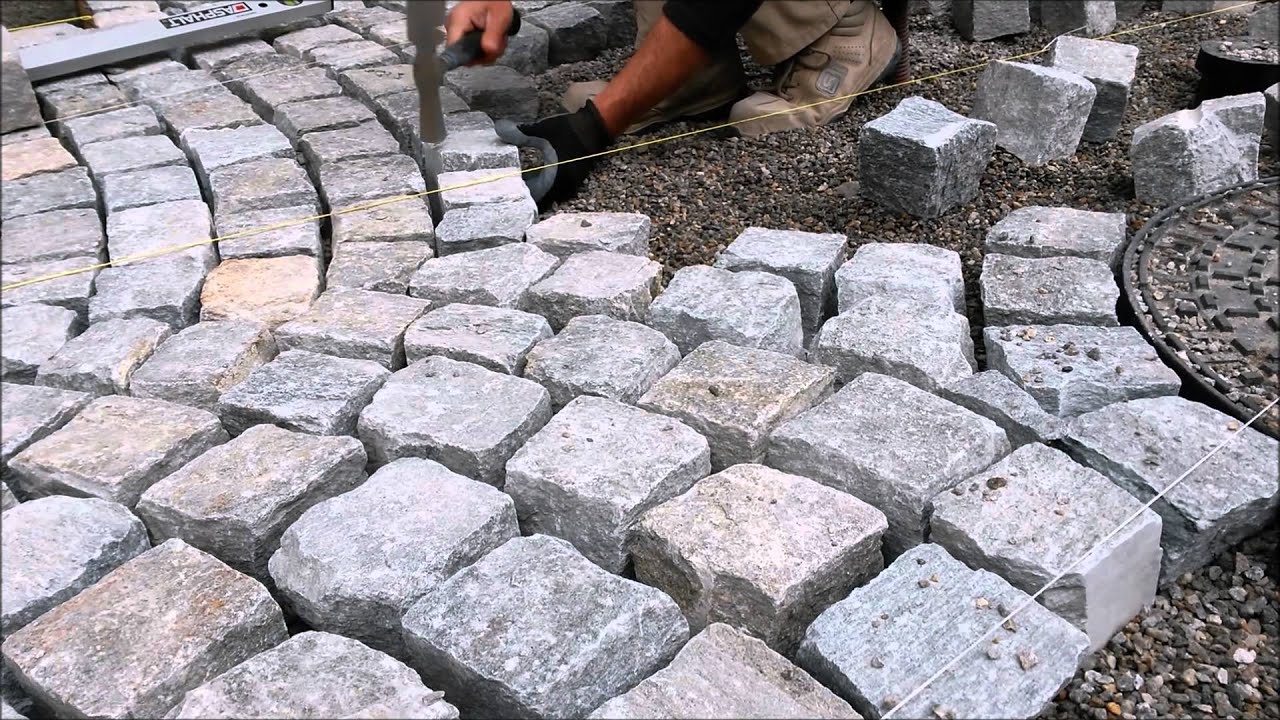 PLM pavimento in pietra di luserna in sampietrini e posa di granito,marmo di apicena(lecce)Svizzera