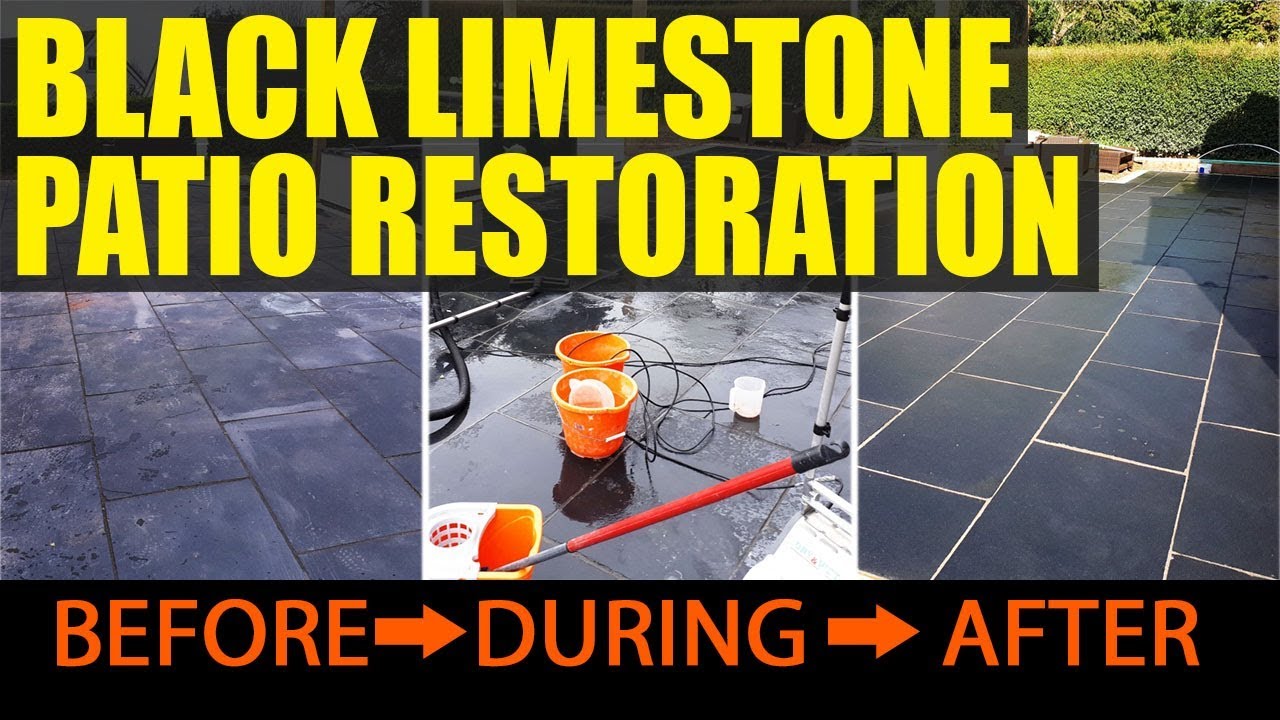 Acid damaged black limestone patio tiles in Bromsgrove