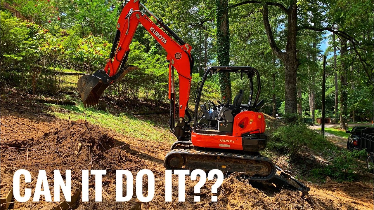 Kubota mini doing a major landscaping project on a bad hill