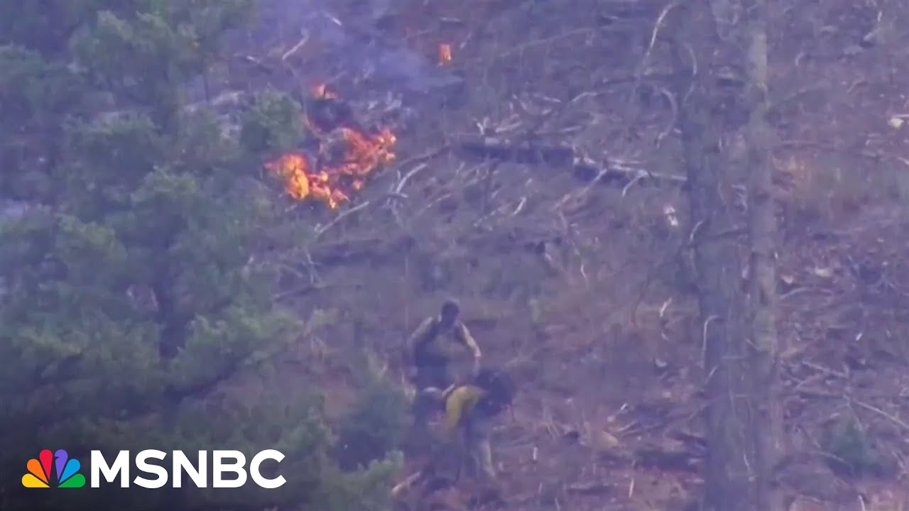 'Absolutely devastating': Two dead, thousands flee New Mexico wildfires 