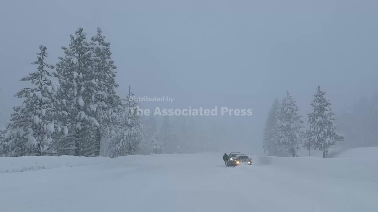 Motorists hampered by severe snow conditions along Interstate 80 in the Sierra Nevada mountains