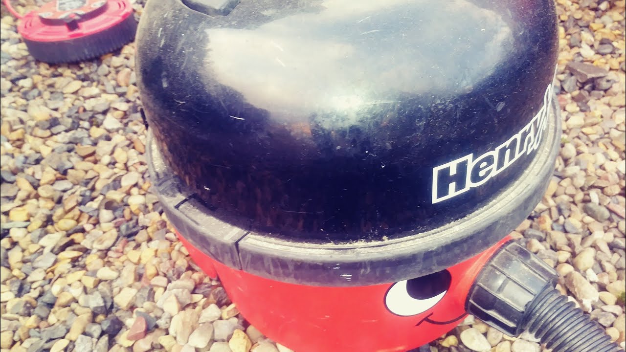 Henry Hoover extra cleaning the car , van