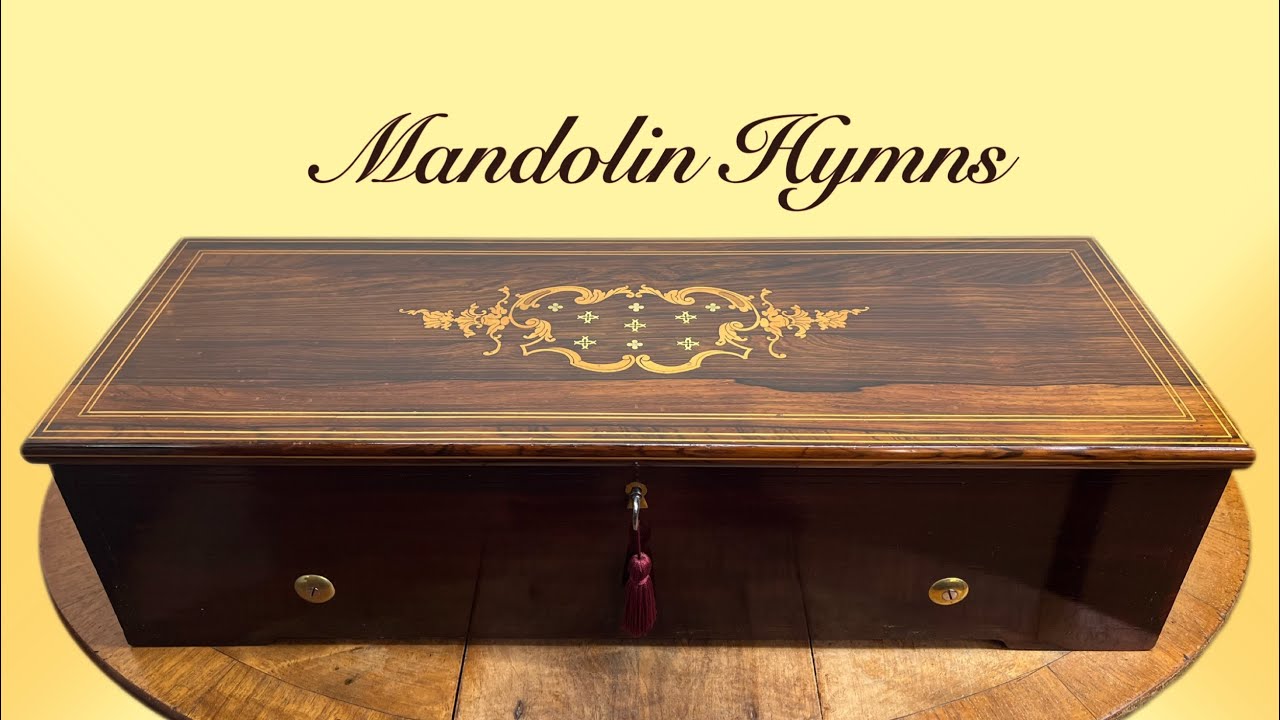 See The Conquering Hero Comes Played on a 4 air Antique Musical Box