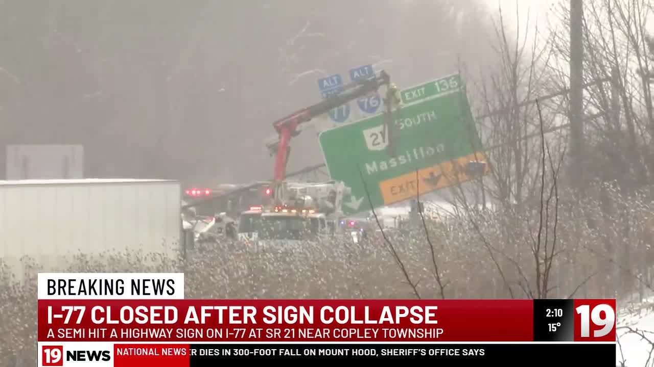 Overhead sign falls across I-77 after semi crash