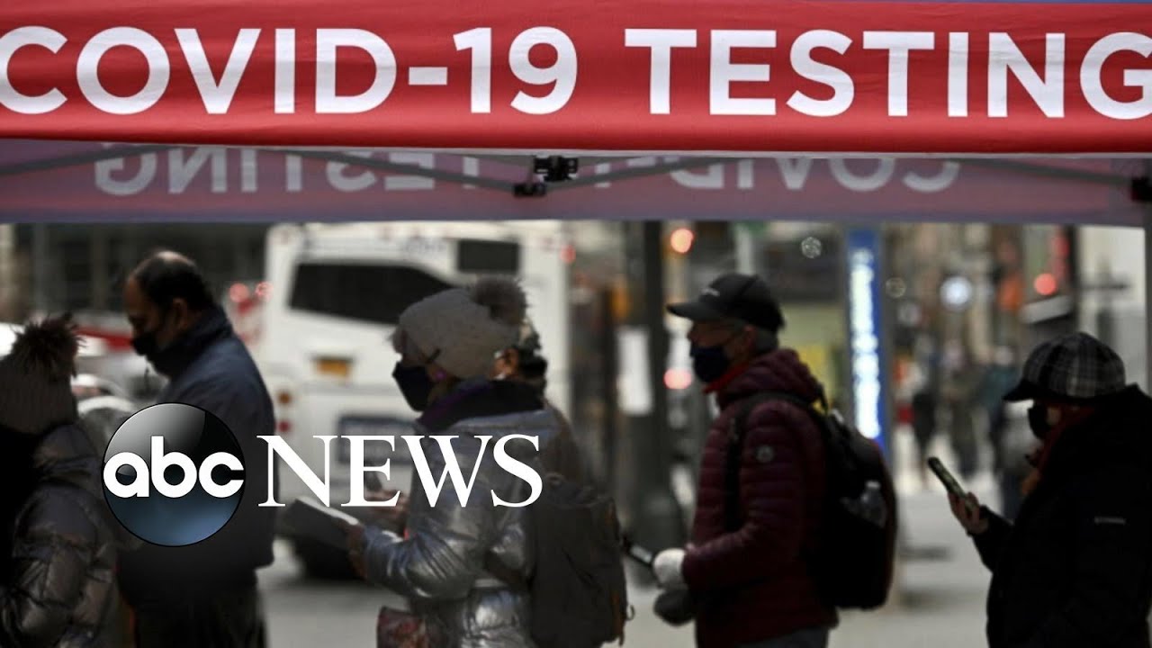 Wave of omicron variant triggers flight cancellations, school testing