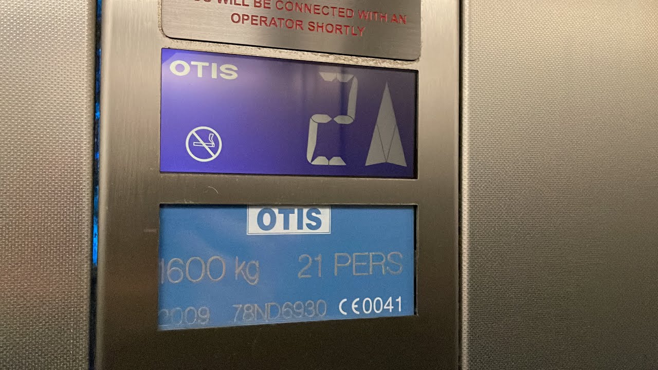 Bottom-driven Otis lifts at the airside food court of Dublin Airport Terminal 2