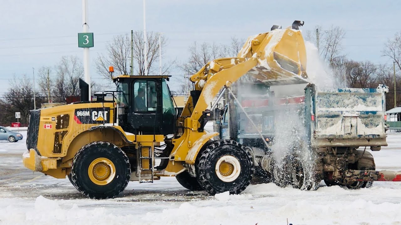 Snow Removal from parking lot Cat 966M