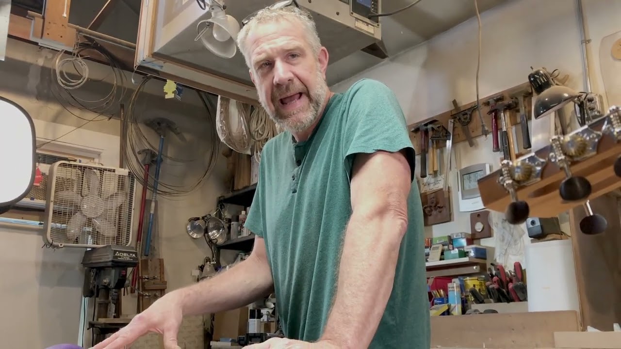 Brent Gilligan Drills the Guitars Sound Hole