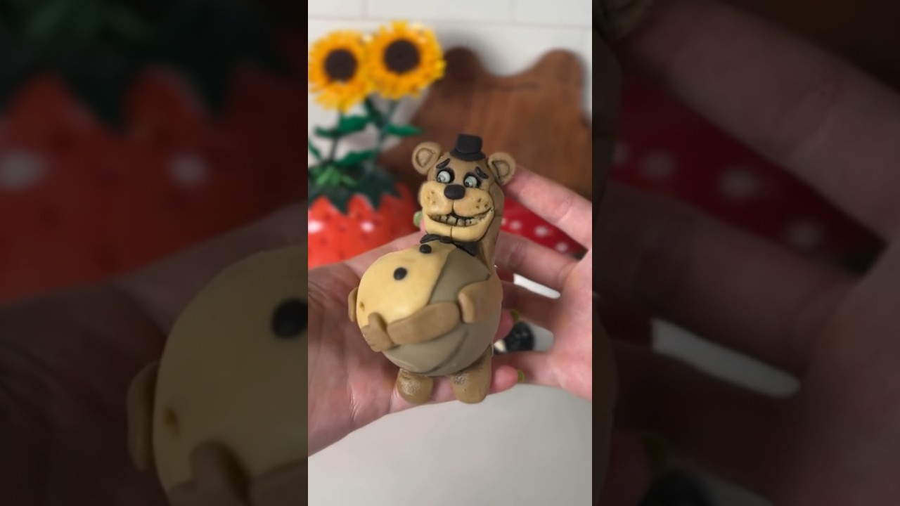 Freddy Fazbear can&rsquo;t wait to meet his animatronic family (pregnant hot cocoa bomb 😭) #fnaf #shorts