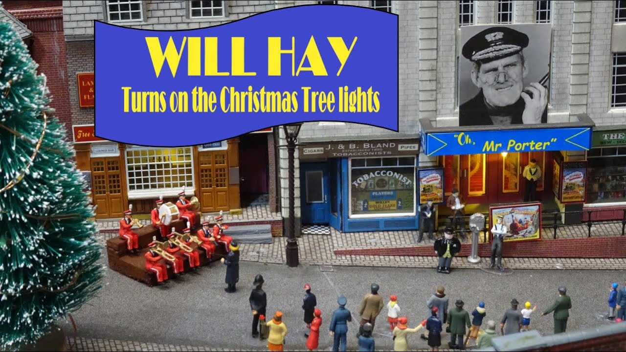 WILL HAY TURNS ON THE CHRISTMAS TREE LIGHTS - IN MELCHESTER HIGH STREET