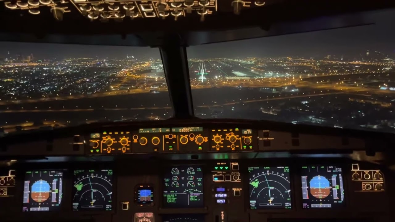 Airbus A320 Cockpit view Landing in DBX Dubai Airport at Night