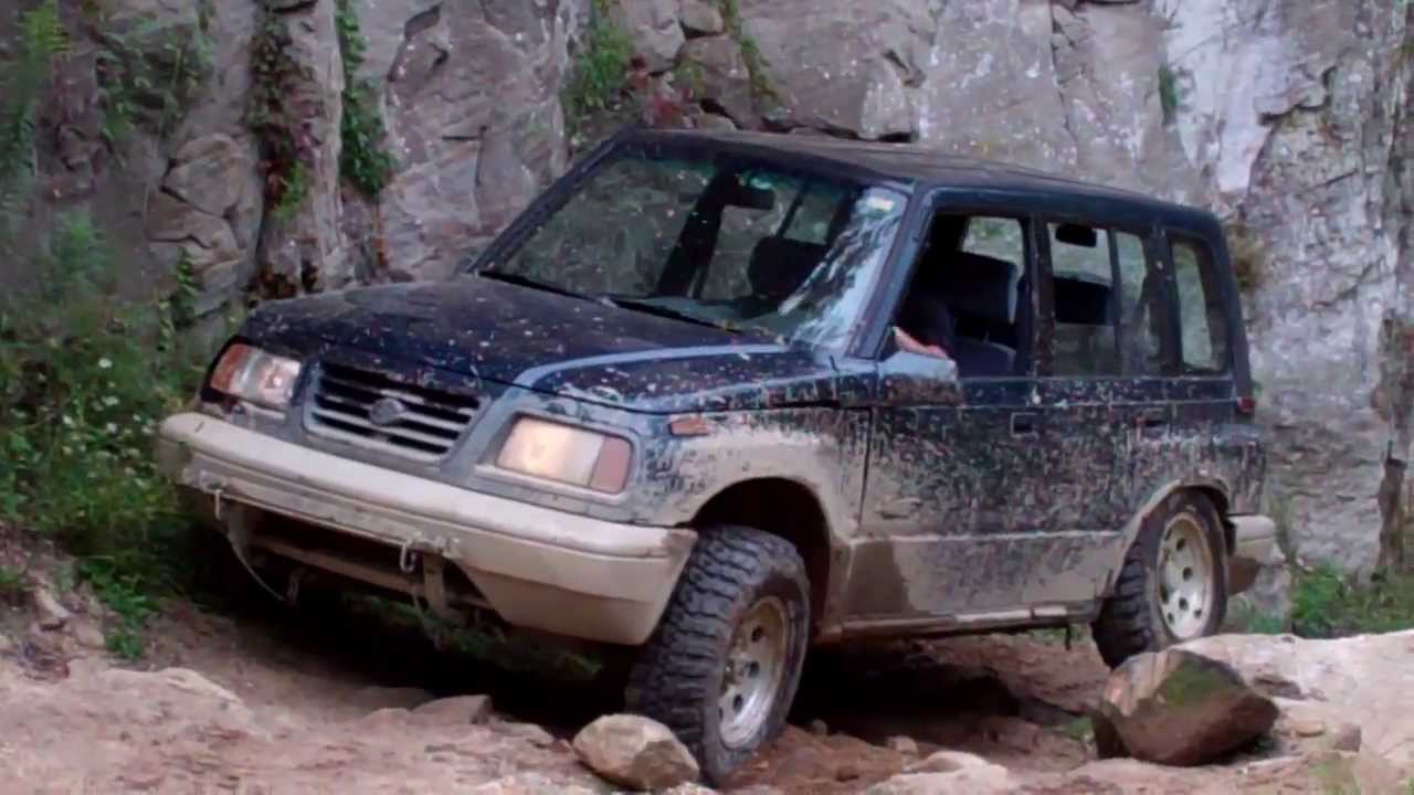 Stock Suzuki Sidekick on rocky trail @ Southington Offroad Park