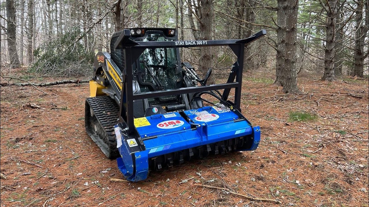 NEW HOLLAND 345 & OSMA SSQ 160 MULCHER FIRST USE. ITS A BEAST!