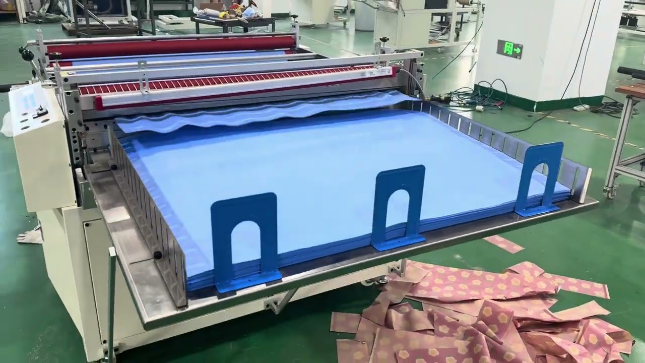 Máquina para cortar y recortar telas no tejidas