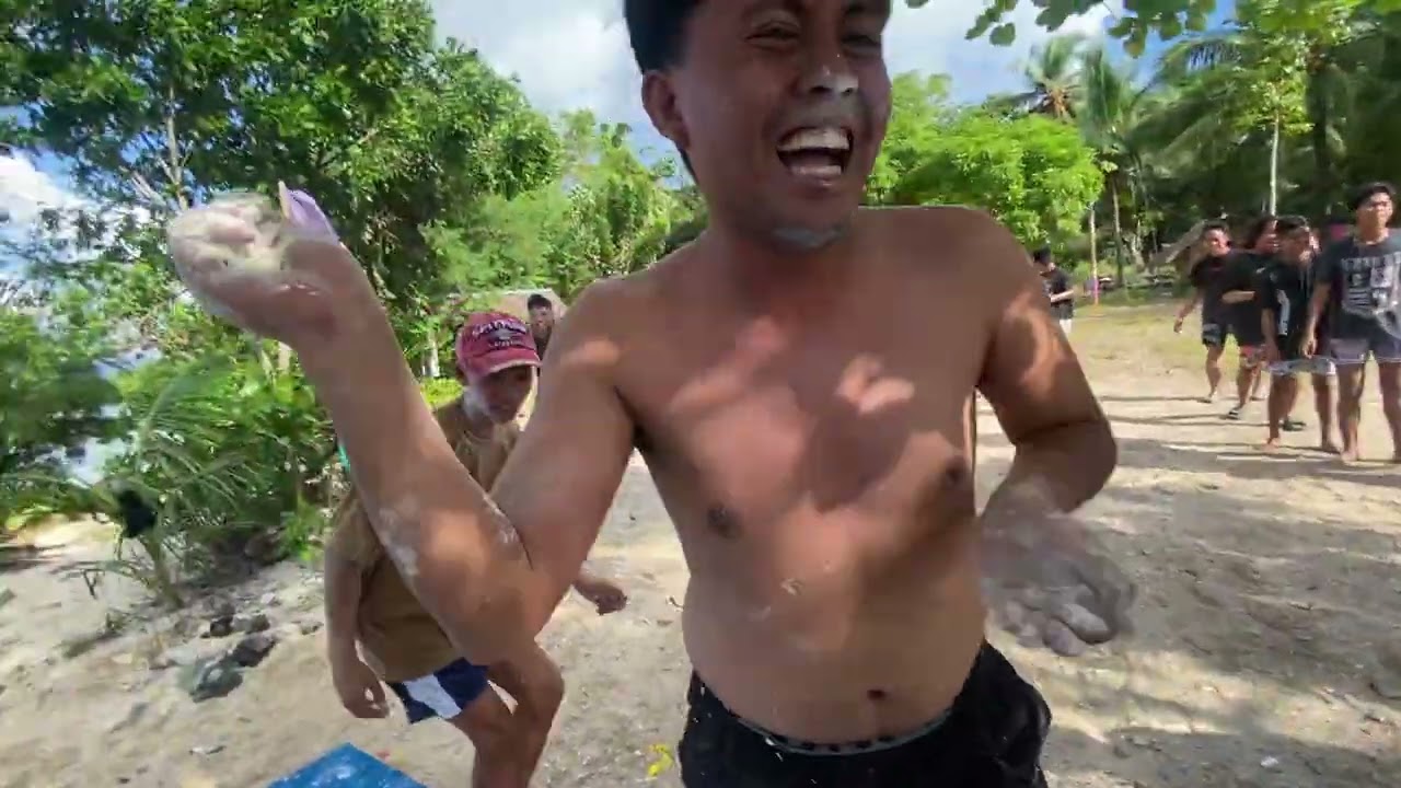 Enjoying at the beach with friends and families crocodile beach, philippines