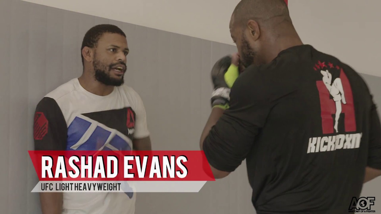 Rashad Evans coaches a frustrated Michael Johnson with his ground game