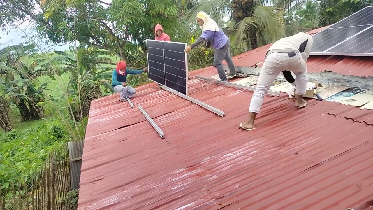 Solar Panels Installation (time laps) fast moving men 
