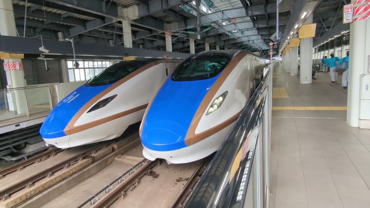 2026年3月13日JR西日本北陸新幹線金沢(駅)回送列車W7系W編成運行 12番のりば到着→停車 W9編成(回送列車)回送2292E 13番のりば停車中→発車 W6編成(回送列車)回送2293E