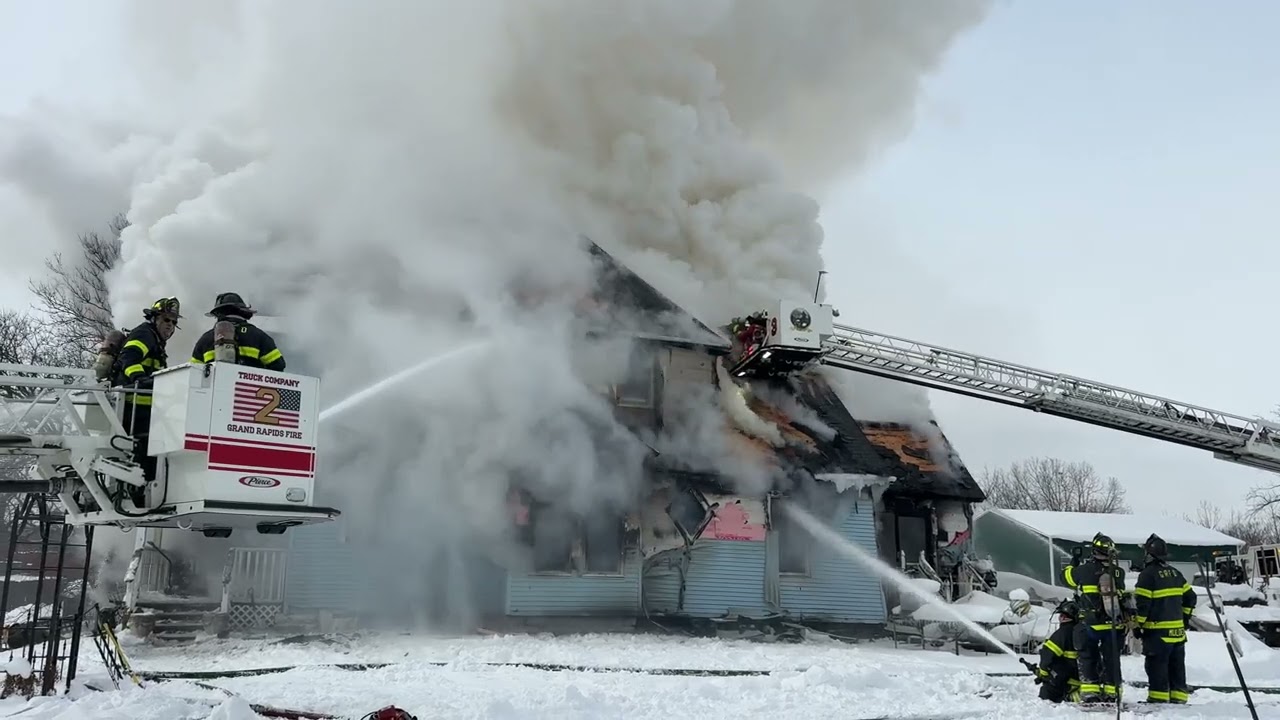 GR Fire Department on scene building fire, it was well involved and compromised upon arrival.